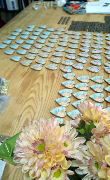 Prepping large heart lockets and tiny constellation lockets for the Fab.com sale!
